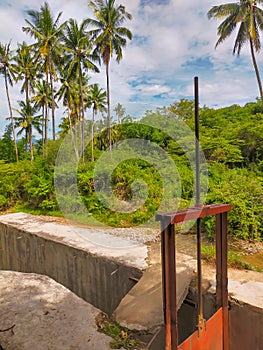 Irrigation sluice gate to channel water to farmers` fields