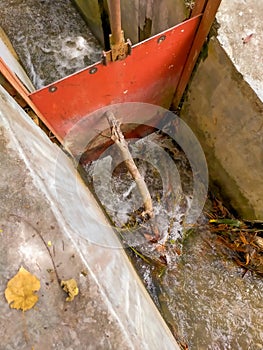 Irrigation sluice gate to channel water to farmers` fields