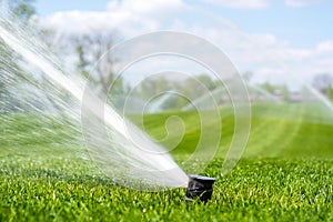 Irrigation system sprinkles water fountain for long distance photo