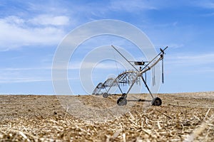 Irrigation system standing on a dry field in Alentejo, Portugal