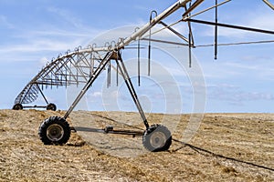 Irrigation system standing on a dry field in Alentejo, Portugal