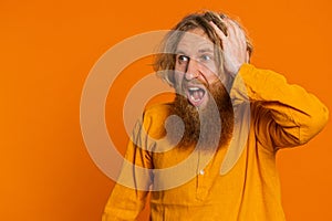 Irritated angry Caucasian man screams from stress tension problems, shock, rage, nervous, quarrel