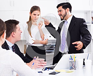 Irritated boss scolding subordinates