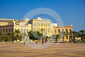 Isa Cultural Centre and plaza in Manama, Bahrain, with palm trees