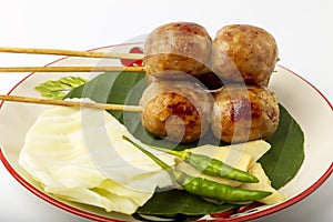 Isaan sausage, grilled on skewers,