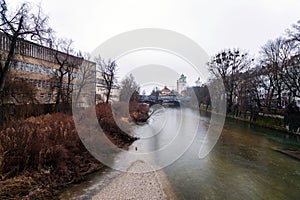 Isar River passing through Munich and the cityscape around the riverbank, Germany