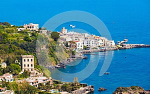 Ischia Ponte bordering waters of Bay of Cartaromana and Guevara Tower on Ischia Island, Italy photo