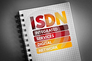 ISDN - Integrated Services Digital Network acronym on notepad, technology concept background