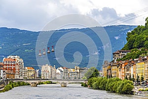 Isere river and Grenoble-Bastille Cable car in Grenoble, France photo