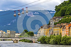 Isere river and Grenoble-Bastille Cable car in Grenoble, France photo