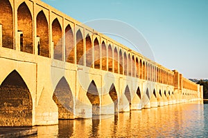 Isfahan, Iran - May 2022: SioSe Pol or Bridge of 33 arches, one of the oldest bridges of Esfahan and longest bridge on Zayandeh
