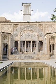 Isfahan Province- Kashan  IRAN-April 30- 2019 Traditional persian courtyard- people visiting the Borujerdi house-Vertical