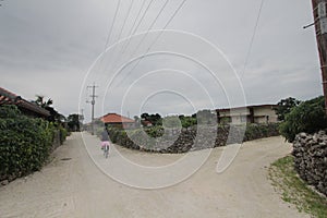 Road, sky, town, property, residential, area, neighbourhood, village, rural, house, tree, land, lot, suburb, cloud, street, plant,