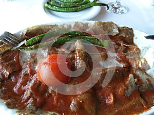 Iskender, translated as Alexander the Great Kebab is a well known ultra high caloric gourmet Turkish dish