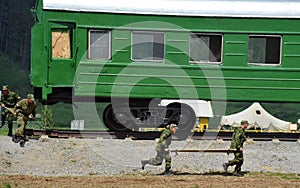 Orderlies running with stretchers to evacuate the wounded soldiers