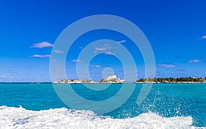 Isla Mujeres panorama view from speed boat in Cancun Mexico