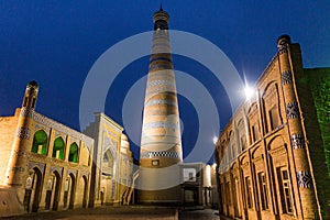 Islam Khoja Minaret and Madrasa in the old town of Khiva, Uzbekist