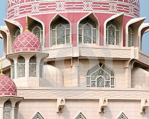 Islamic architecture, details of mosque exterior, dome with decorative pattern, arched windows