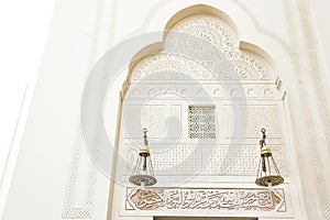 Islamic art patterns on a mosque wall