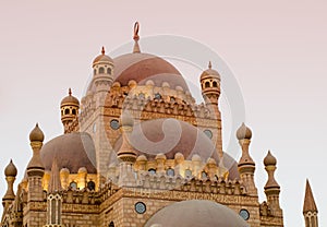 Islamic background with The Al Sahaba Mosque in Sharm El Sheikh against ramadan dusk sky and crescent moon. Fragment