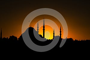 Islamic background photo. Silhouette of Suleymaniye Mosque at sunset.