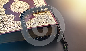 Islamic Book Koran with rosary