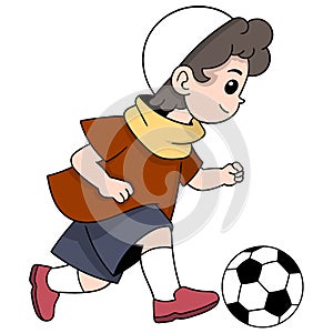 Islamic boy playing soccer dribbling a ball