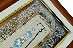 Islamic calligraphy characters on paper with a hand made calligraphy pen