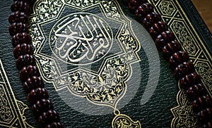 Islamic concept - The holy Quran, Islamic Holy Quran, and Subha on Soft Light photo