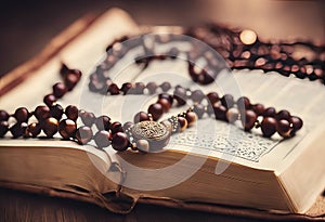 Islamic prayer beads or tasbih on the holy Quran, vintage view. It is suitable for Ramadan-themed design concept backgrounds or