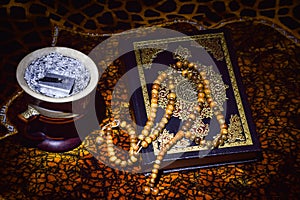 Islamic Quran with thasbeeh count and bukhoor in a nice background