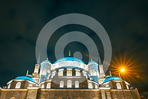 Islamic or ramadan background photo. Eminonu New Mosque or Yeni Cami at night