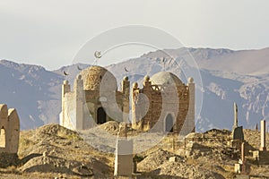 Islamic tombs in graveyard in rural Kyrgyzstan