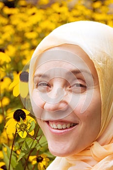 Islamic woman in the flowers