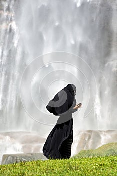 Islamic woman using a smartphone