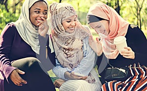 Islamic women friends talking and having fun