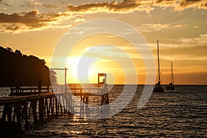 Island beach sunset pier thailand people couple silhouette