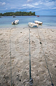 The island, the boats, the cloud and the blue sky, beautiful view of Iboih Beach, in Sabang, Indonesia