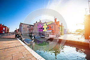 Island of Burano colorful houses and channel sunset view