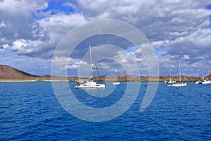 Island de Lobos, Corralejo, Fuerteventura, Spain - November 25 2023: boats in front of the solitary island