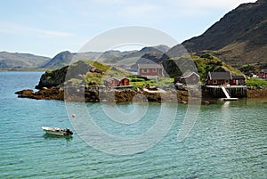 Island with fishing village in the middle of fjord