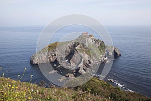 Island Gaztelugatxe on the coast of Biscay photo