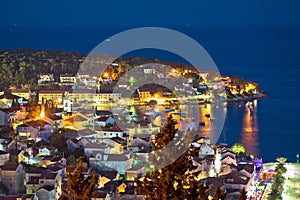 Island of Hvar town waterfront aerial evening view