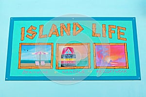 Island life, postcard, wall, graffiti, murals, drawings, street art, beachwear, sandals, Key West