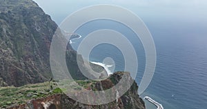 Island of Madeira coastline high rocky cliffs. Beautifull mountains nature and ocean landscpape in Portugal.