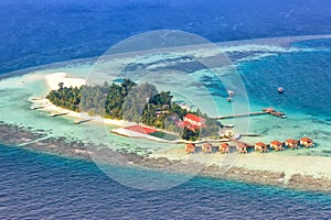 Island Maldives vacation paradise sea Maayafushi Resort aerial p