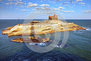 Island at ocean near Cape Comorin in Kanyakumari photo