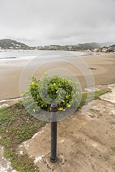 Beach at San Juan del Sur Nicaragua on an overcast day photo