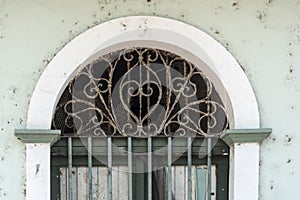 Weathered Arched window top Old Town Panama photo