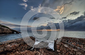 The island`s first nudist beach, with an extensive sandy area topped by a stone defensive tower